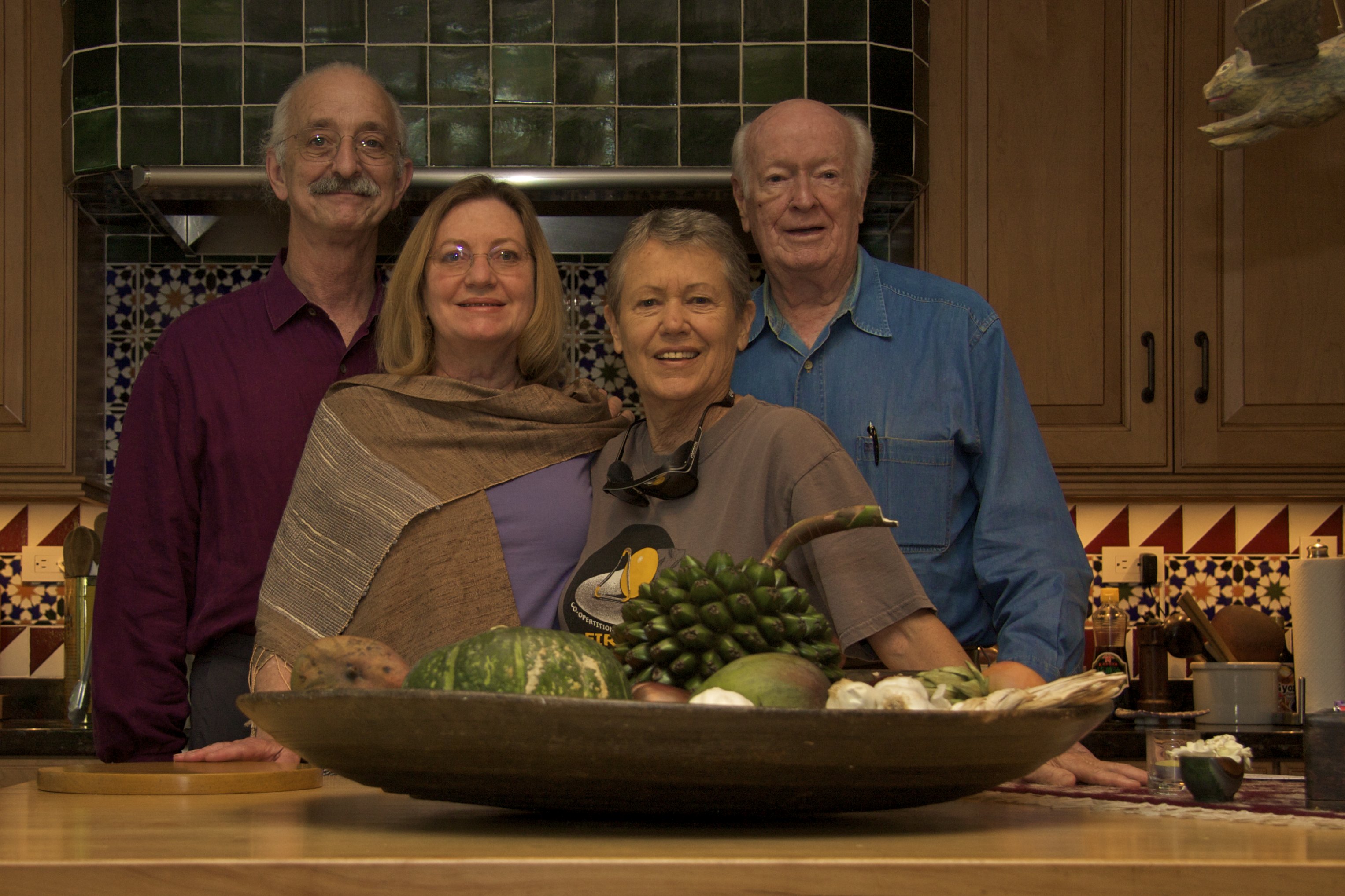 Dr. Woodie Flowers, Margaret Flowers, Bev Murphy, and Dr. William Murphy standing together in a kitchen