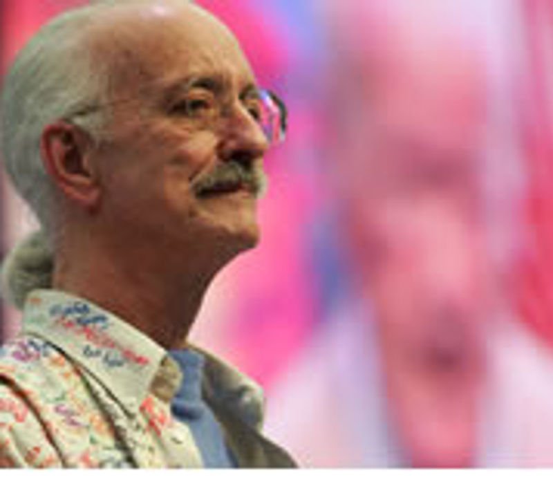 Dr. Woodie Flowers on stage at a FIRST event